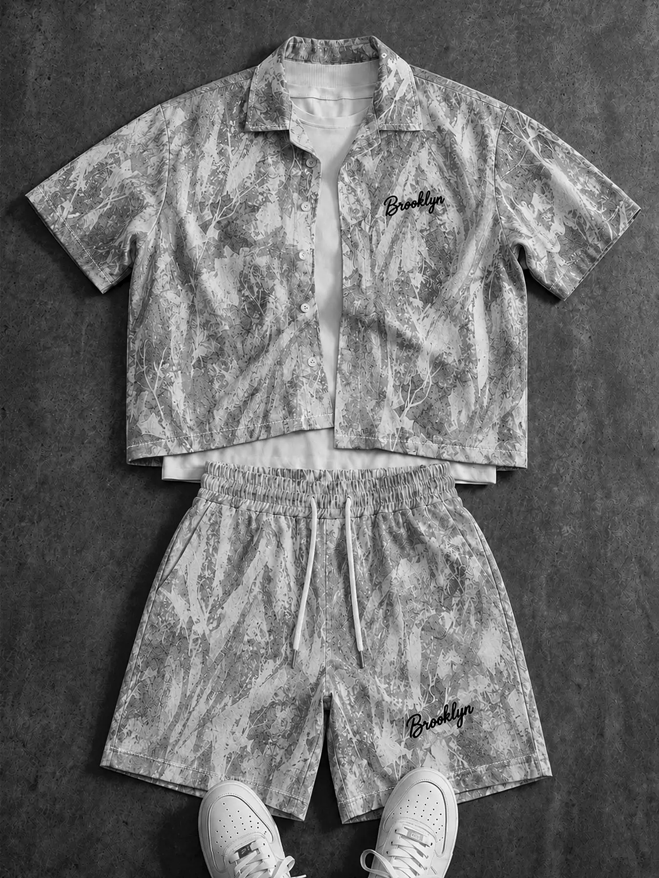Summer two-piece set in purple with a branch pattern, made of lightweight, breathable, and soft fabric. Features a simple Brooklyn letter design, perfect for beach trips, casual street walks, pool parties, and relaxed vacations.