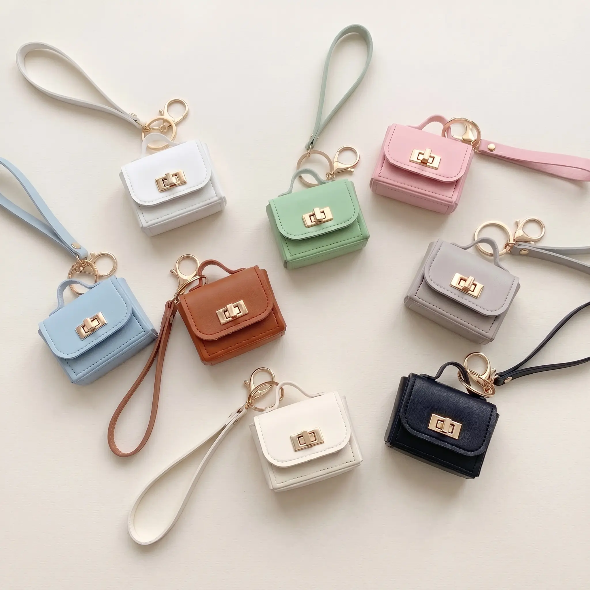 Mini pouch keychain, stores earbuds and small gadgets. Ideal gifts for graduation, school rewards and party favors KeychainCharm -YY1