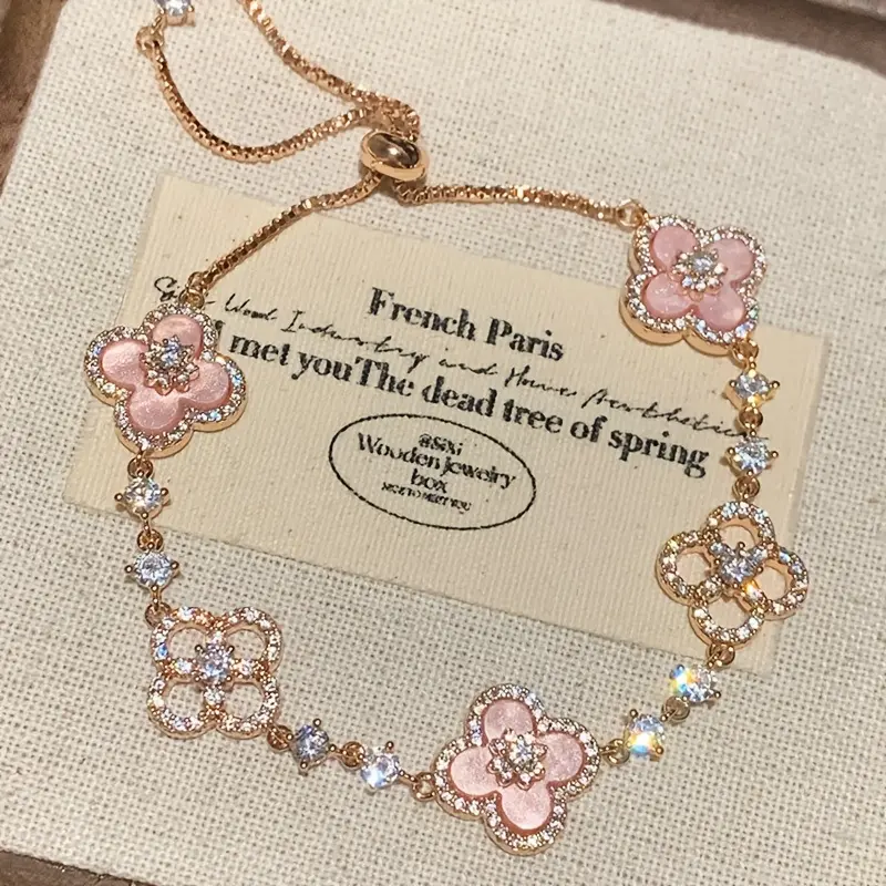 Women's Alloy Adjustable Pull-Out Bracelet - Elegant Diamond-Inlaid Hollow Flower, Mock Mother-of-Pearl Petals, Female Daily Wear Costume Jewelry Wrist Accessory