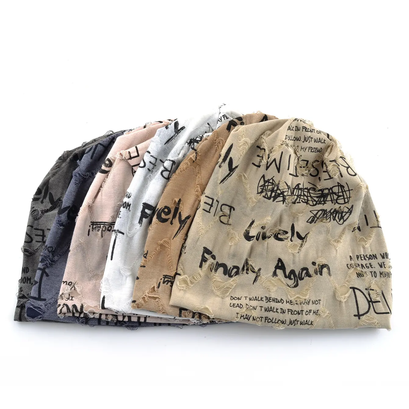 Upgrade your look with this 6-pack distressed beanie set. Featuring edgy graffiti prints and unique ripped textures. Soft breathable and perfectly slouchy for your daily streetwear outfits. Six neutral colors to match any aesthetic. Tap to shop.