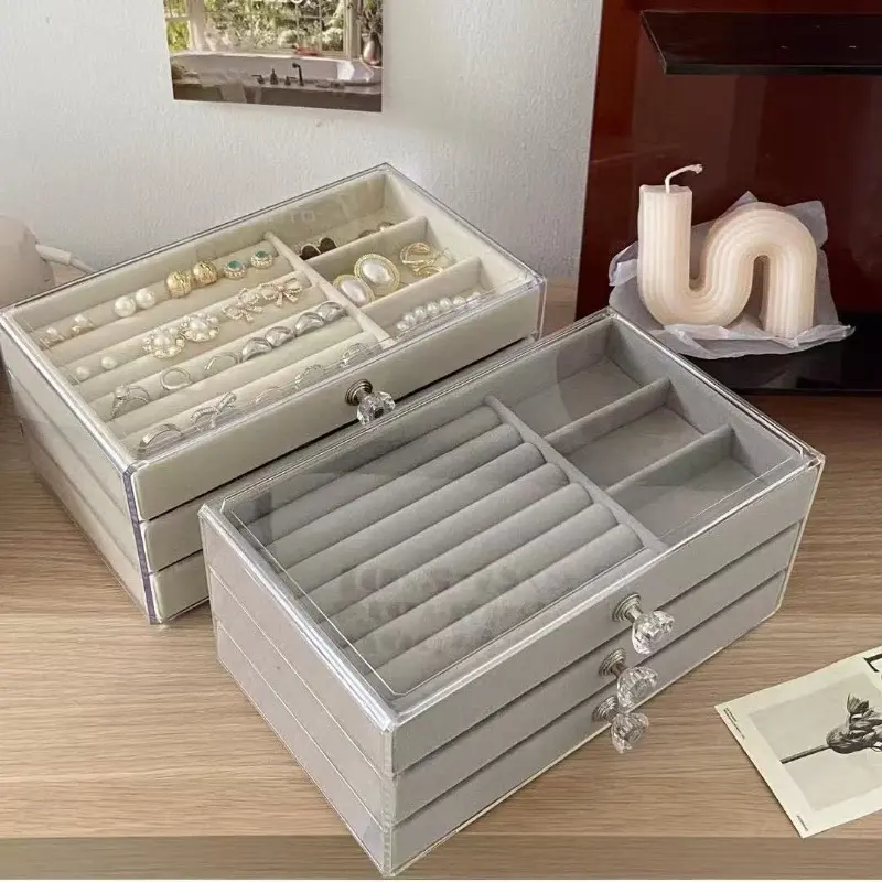 Multifunctional layered acrylic jewelry storage box - The upper layer is a slot for rings, and the lower layer has double-layer multi-compartment drawers. A desktop-style integrated organizer for necklaces and earrings.