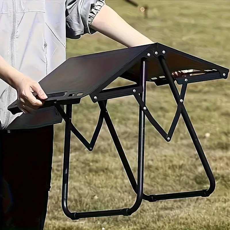 Portable folding camping table, lightweight iron outdoor dining table with compact design suitable for camping, beach, barbecues, tailgating parties, hiking (foldable). Includes light stand and storage bag.