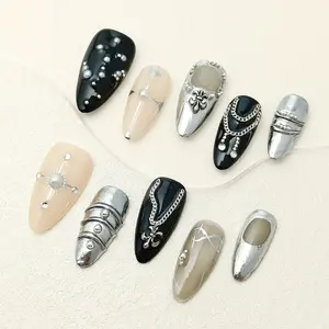 Handmade Gothic Press On Nails Kit 10 pcs, Nude & Black Almond Nails with Silver Cross, Chain & Sunburst Accents, Grunge Y2K Reusable Fake Nails Perfect for Bold & Edgy Style Handmade Press Ons Almond Nail Tips