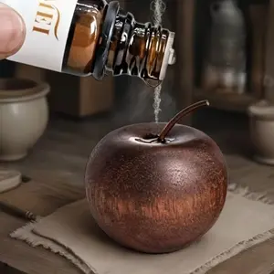 A wooden apple-shaped diffuser, suitable for use in both home and car, a decorative item for home tabletop, a natural wooden essential oil diffuser, and a festive decoration piece, Car Diffusers
