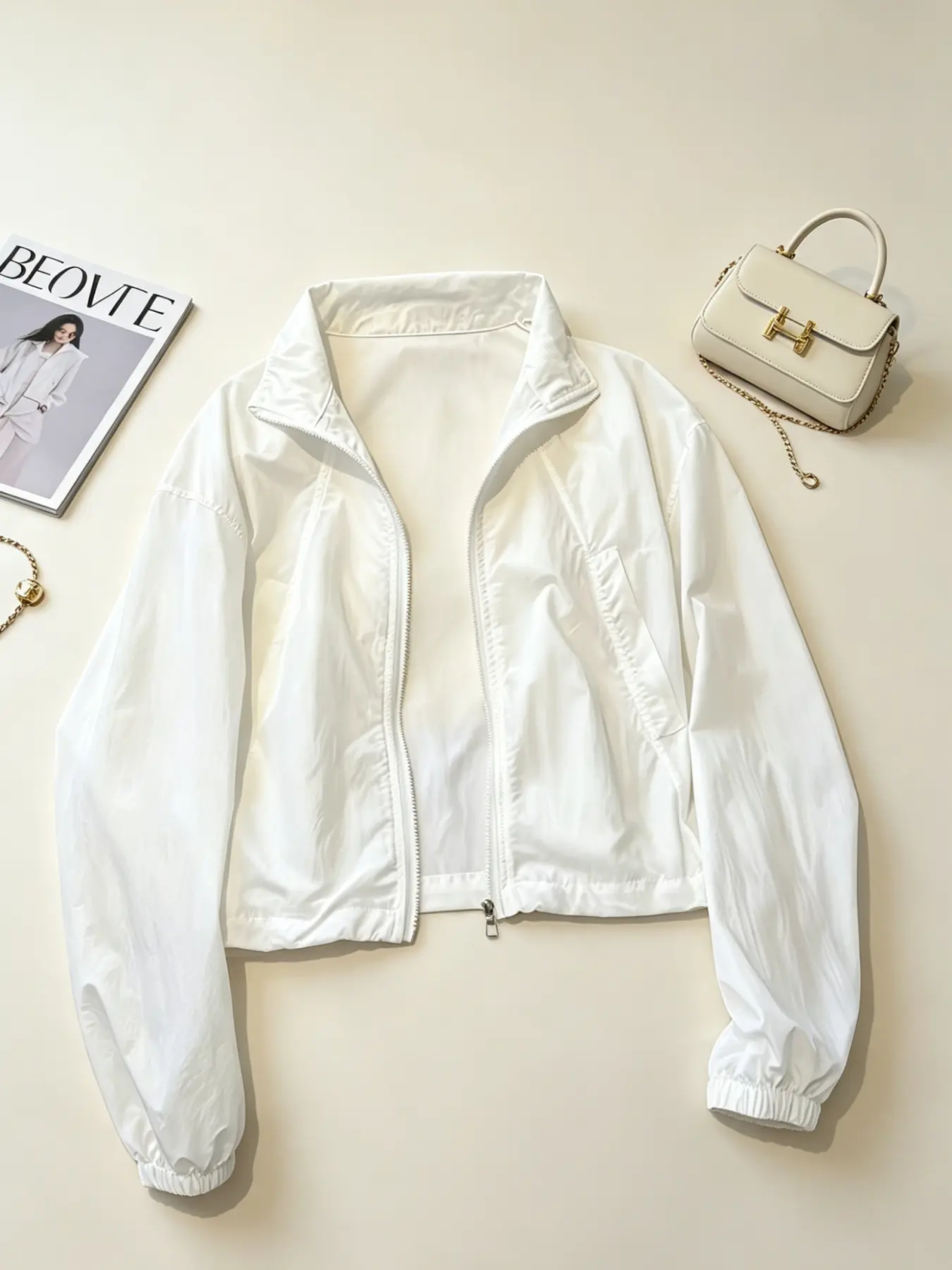 A women's fashionable pure white stand up collar zipper Long Sleeve casual Plain jacket, with lightweight and slightly wrinkled sleeves and side pockets, suitable for commuting, outdoor play, indoor and outdoor wear