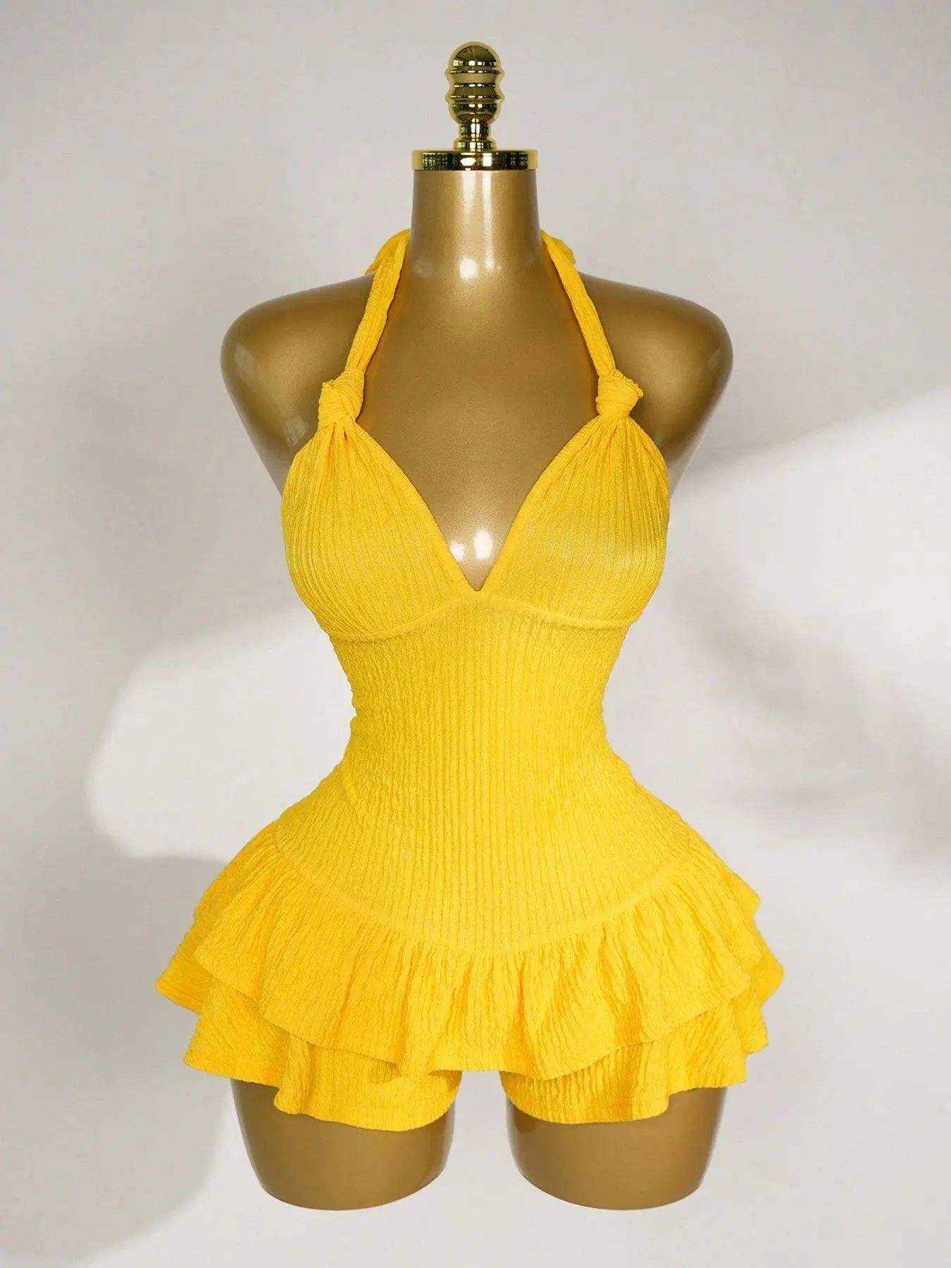 This Crinkle Halter Sleeveless Ruffled Romper Jumpsuit is Effortless Summer Party Glam Chic Ruffle Hem Bodycon One-Piece Outfit