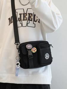 unisex summer casual plain color release buckle crossbody bag with astronaut charm, y2k fashionable versatile zipper work crossbody bag for women with random color badge, crossbody purses