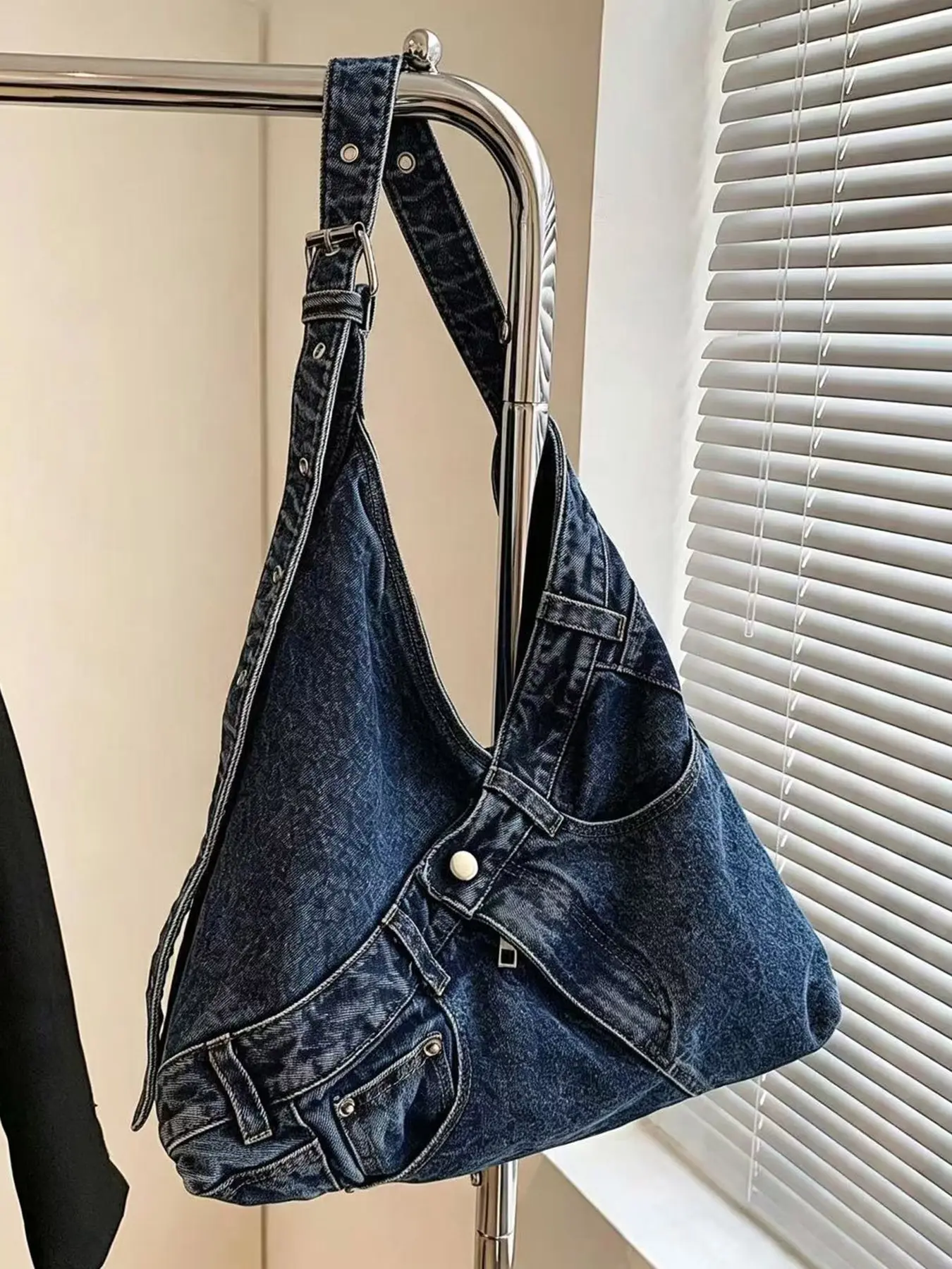 Fashionable and creatively distressed blue denim single-shoulder bag, featuring a unique V-shaped design with soft denim material, lightweight and easy to carry for daily commutes, shopping, and outings, a simple and versatile tote and shoulder bag.