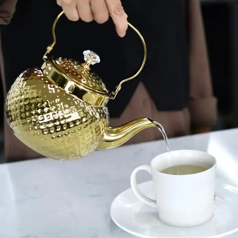 A Middle Eastern hammered design stainless steel teapot - heavy-duty 201 stainless steel with a filter, suitable for use on induction cooktops/gas stoves, oven-safe for both home and restaurant use Teapot With Strainer