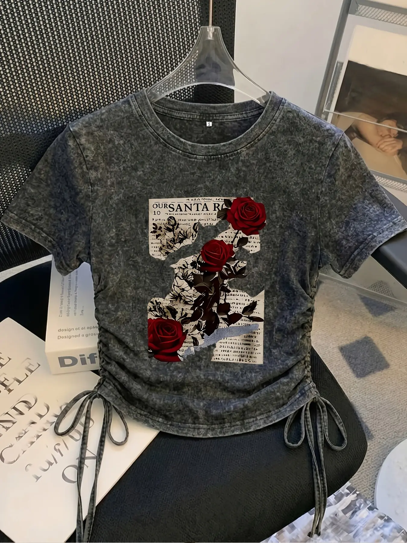Dark retro Vintage newspaper-print rose tee with side drawstrings; features a washed texture, slim fit, and cropped cut. Accentuates the waist for a flattering silhouette—perfect for a trendy, edgy "hot girl" aesthetic and Instagram-worthy photos.