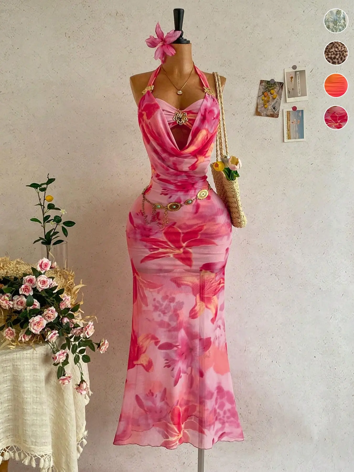 A vacation-style tie-dye floral print maxi dress with a draped halter neck, featuring sheer mesh and metal buckle details. Ideal for beach getaways, tropical trips and summer parties.