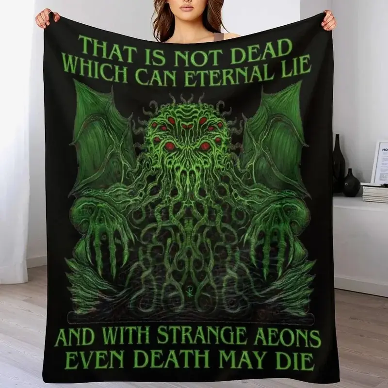 A plush, soft green Cthulhu-themed blanket, perfect for bedrooms and living rooms.