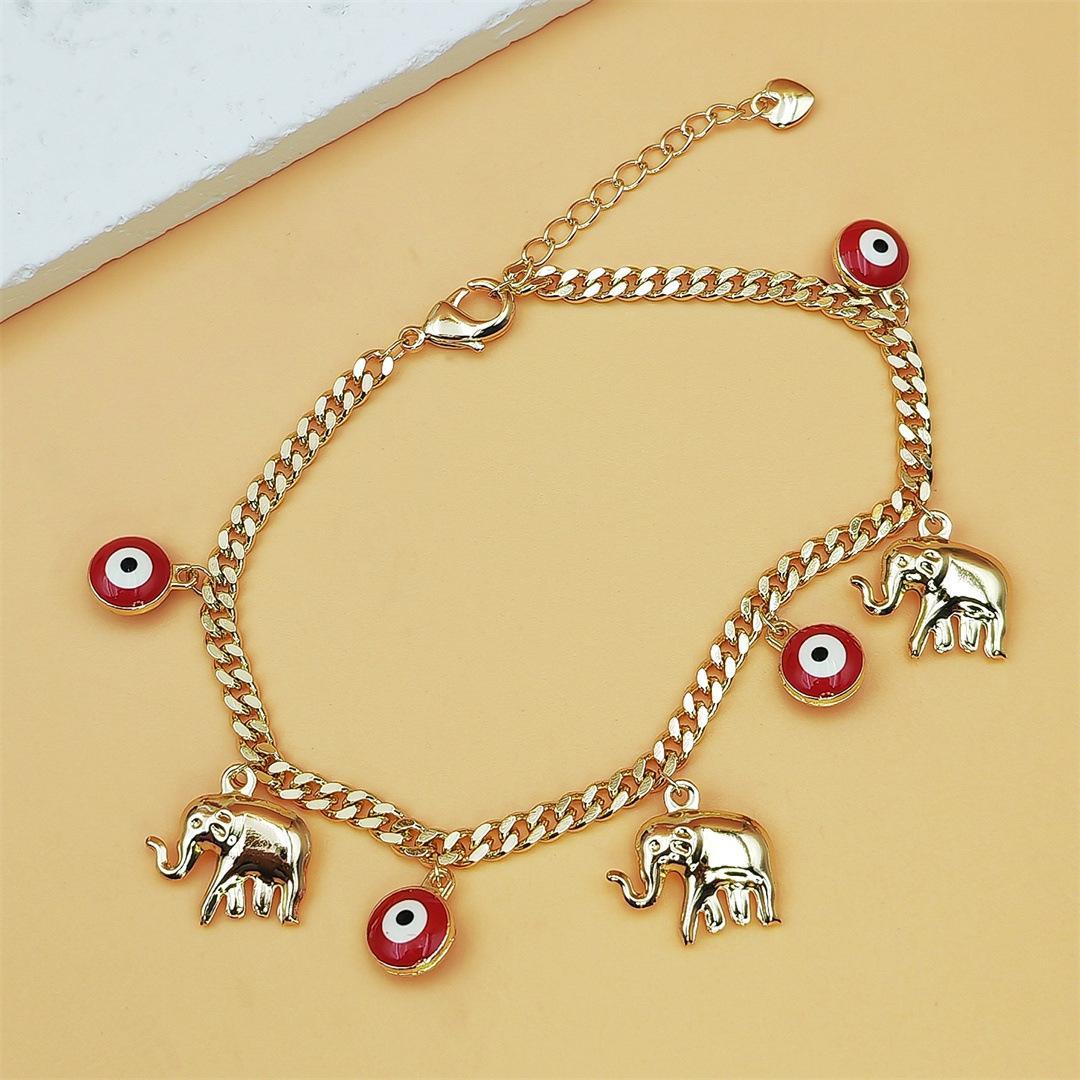 Gold Devil's Eye Lucky Elephant AnkletY2K Aesthetic Red Evil Eye Pendant Anklet Adjustable Gold Plated Chain Anklet for Party Birthday Holiday Gift Daily Wearwith Baby Elephant Pendant Adjustable Length for Stylish Accessory
