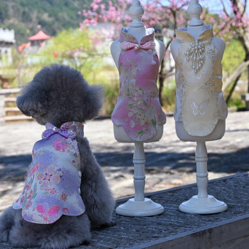 Paws Trendy Pet Spring & Summer Qipao for Dogs & Cats, suitable for Teddy, Bichon Frise and other small dogs. Features embossed fabric with exquisite retro frog buttons, fine workmanship, exuding noble elegance and making your beloved pet stand out.