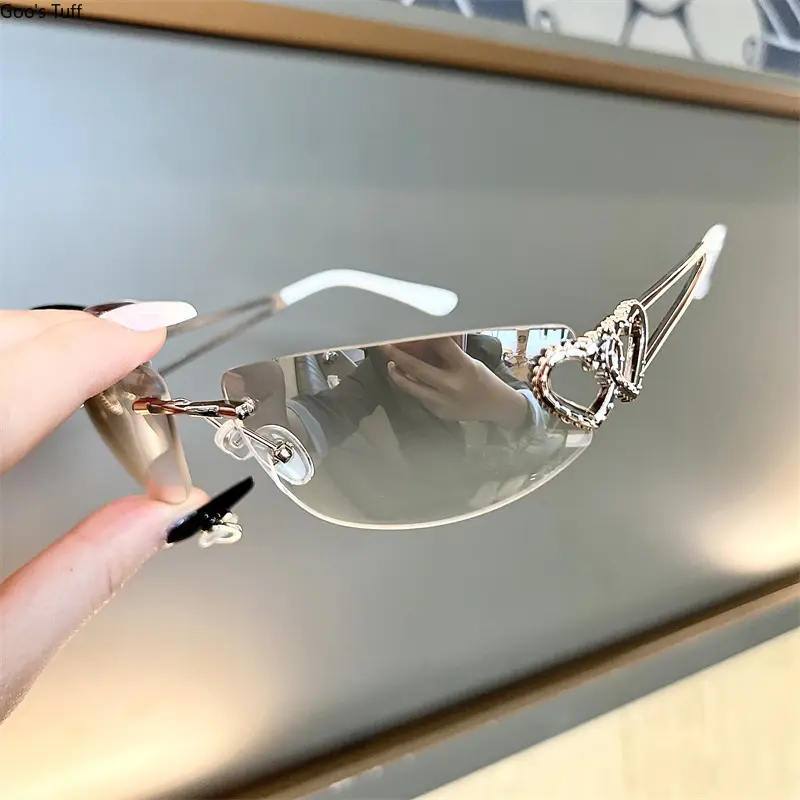 Women's Retro Frameless Hollow Metal Heart Cat Eye Sunglasses with Mercury Lenses - Y2K Trendy Sweet Cool Shades for Daily, Party Outfits
