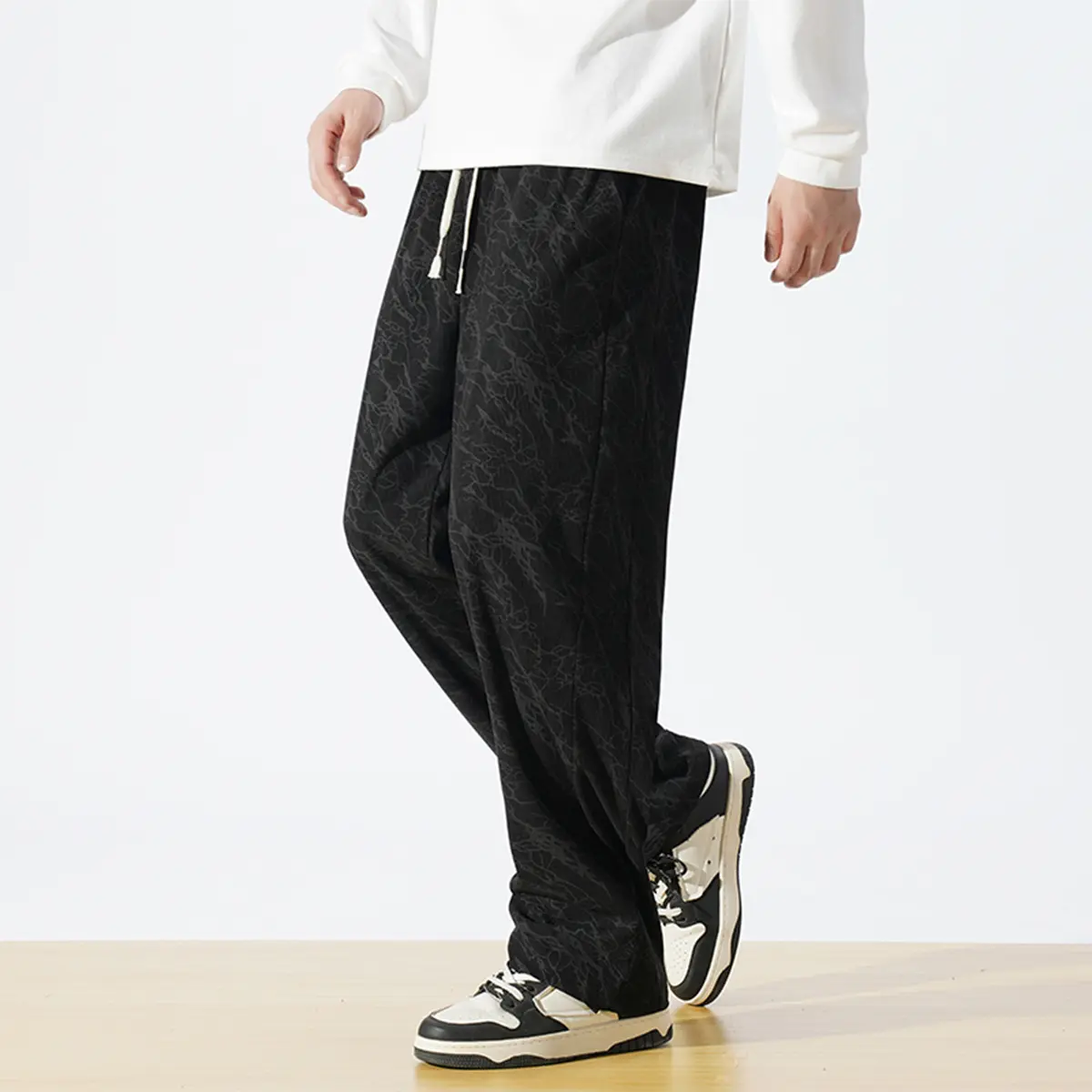 Stylish Dark Marbled Printed Men Wide‑leg Trousers, Comfortable Adjustable Drawstring Waist, Subtle All‑over Crackle Texture Design, Soft Light‑weight Loose‑fit Streetwear Pants, Perfect for urban trips, weekend hang‑outs, daily errands and relaxed casual