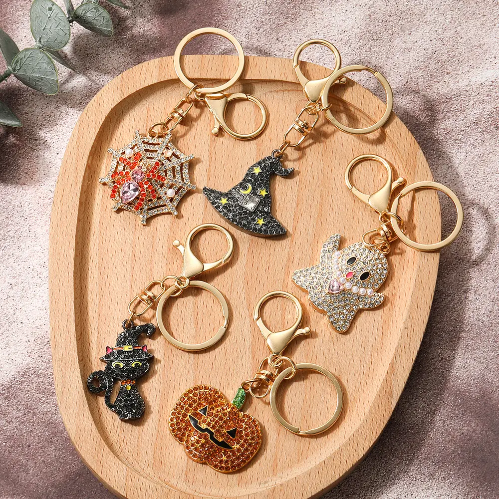 Unisex Halloween Rhinestone Keychain - Viral Luxury Crystal Bag Charm with Witch Hat, Pumpkin, Ghost, Black Cat, Spider Web Charm Shapes, Sparkly Gold Lobster Clasp Key Ring for Purse, Backpack, Holiday Party Gift