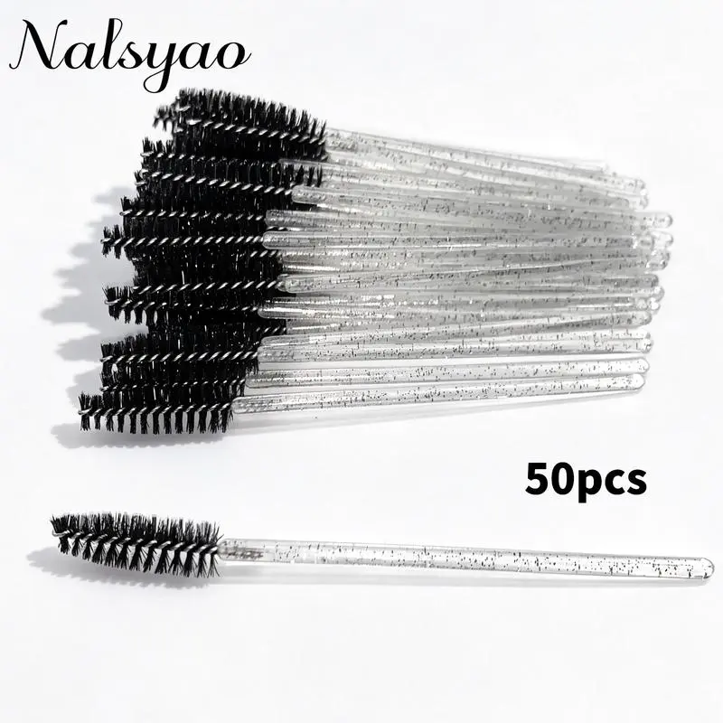 50Pcs disposable mascara wands with crystal clear handles, suitable for mascara application, lash extension brushing, eyelid cleansing, and residual glue removal. Individually sealed packaging, hygienic and portable, ideal for both professional lash artis