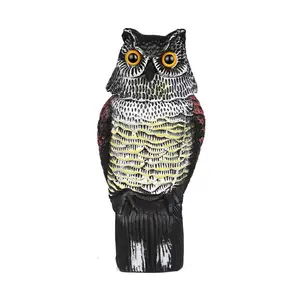 Owl decoy garden bird repellent with rotating head, realistic eyes and waterproof design, effectively deters birds by simulating predators