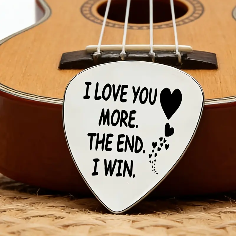 A fun love confession with a stainless steel guitar pick - conveying the sweet promise of "I will always love you more", suitable for the emotional needs of lovers, significant others or music lovers, music feelings ".