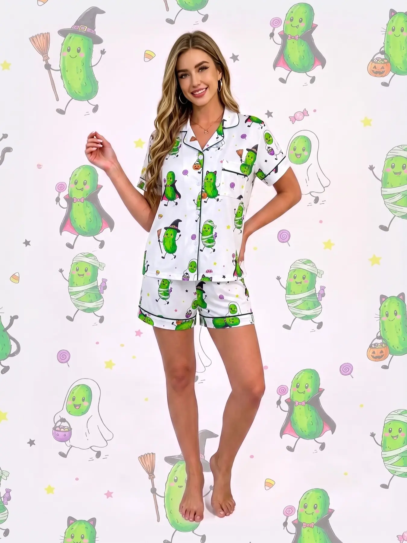 Women's 2-piece pajama set white base with Halloween pickle cartoon prints Mummy witch vampire cucumbers with pumpkins and candies Fun holiday style Green trim lapel short sleeve top with pocket elastic waist shorts soft comfy all-season loungewear