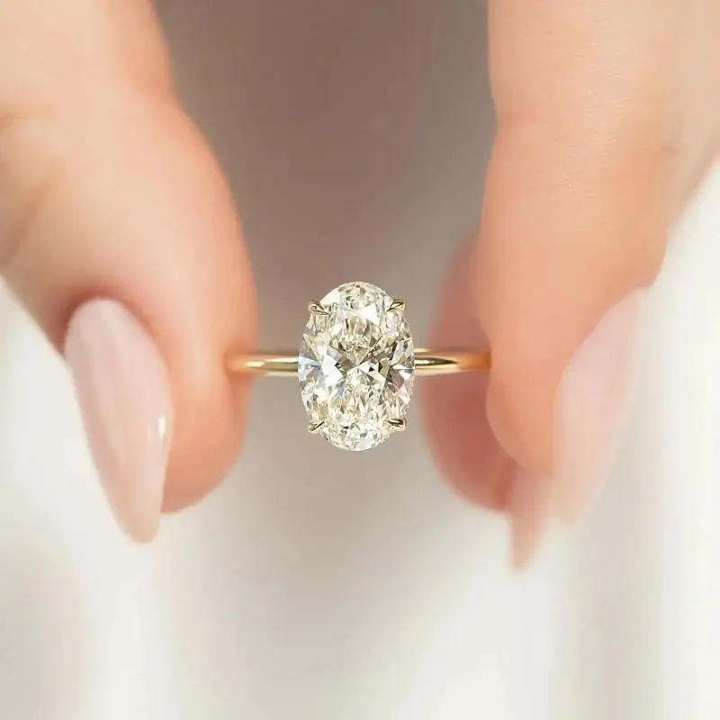 Women's Oval Cut Cubic Zirconia Solitaire Ring - 4-Prong Gold-Tone Band, Oval Stone Engagement Promise Jewelry, Casual Wear Gift for Birthday Anniversary
