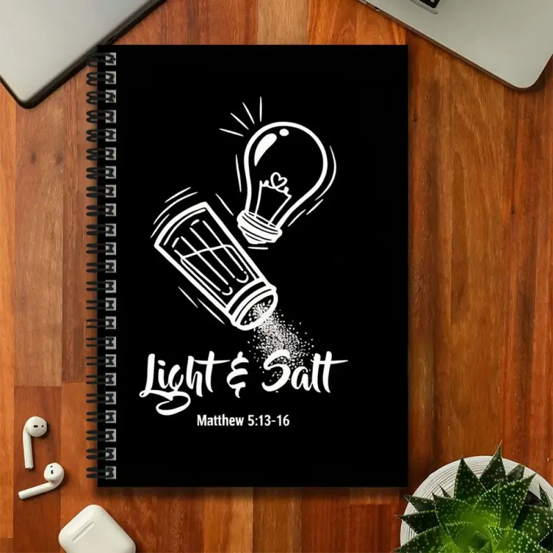 A creative Christian-themed spiral-bound notebook, featuring a cover design of light bulbs and salt shakers, paired with the phrase "Light & Salt" and the scripture Matthew 5:13-16. Suitable for work records, study notes, and also makes a unique gift for