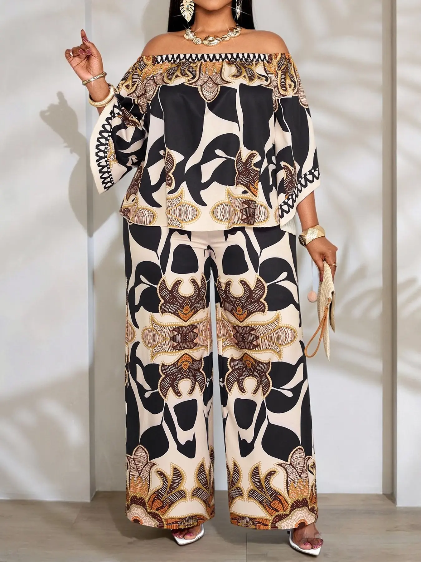 Summer Casual Fashion Plus-Size Women's Printed Pant Set: Two-Piece Outfit featuring an Off-Shoulder Batwing-Sleeve Top and High-Waisted Wide-Leg Trousers — Stylish Plus-Size Summer Apparel Open Shoulder Set