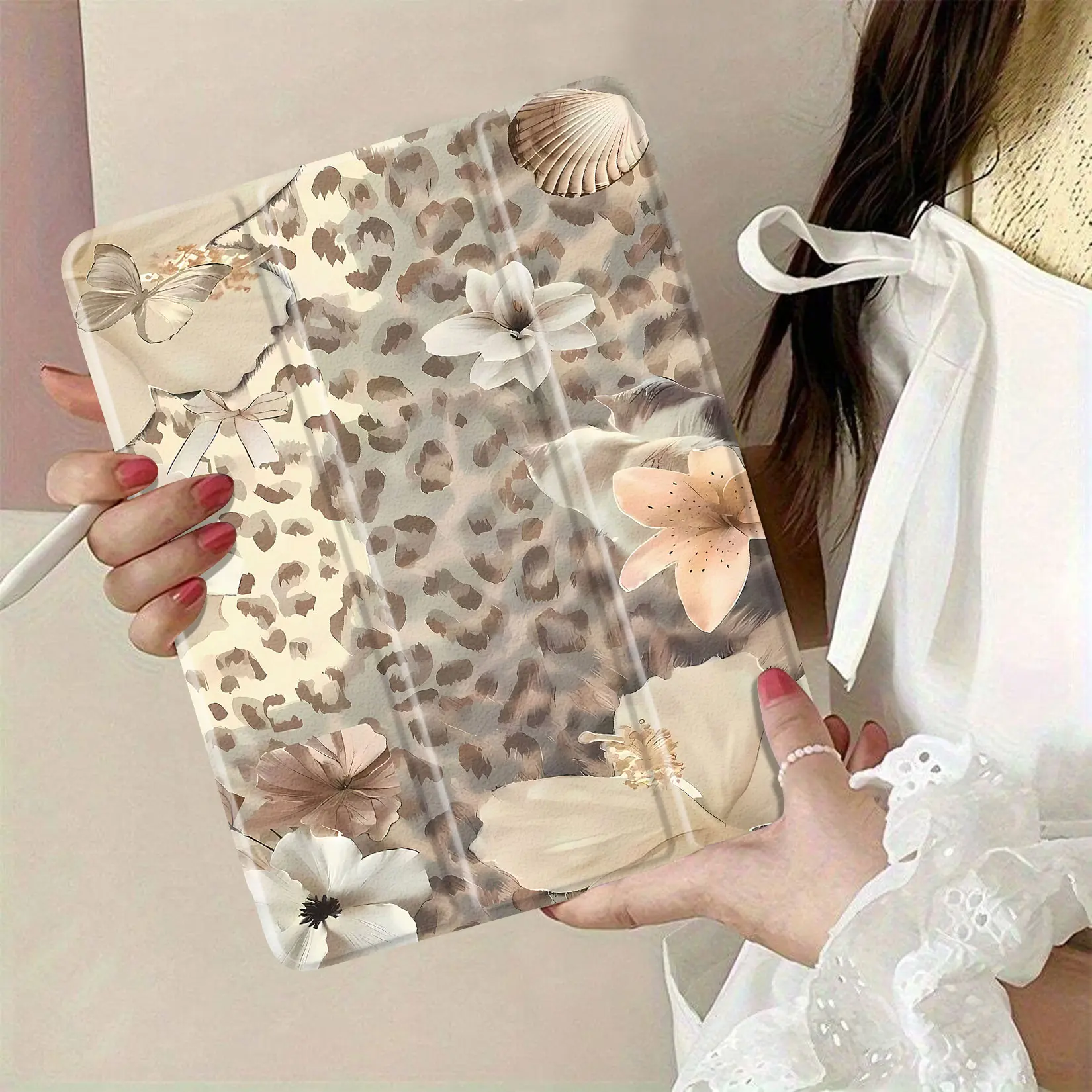 Floral leopard print fabric designed for crafts and upholstery projects featuring soft pastel colors and elegant patterns perfect for home decor or fashion accessories