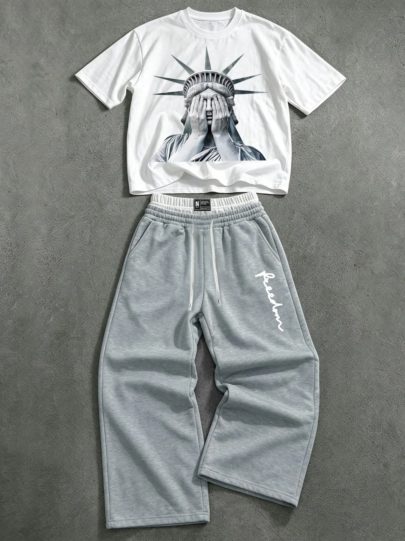 American Statue of Liberty print short-sleeved set, unisex, with Adjustable double drawstring waist belt, wide-leg sweatpants, casual two-piece set.