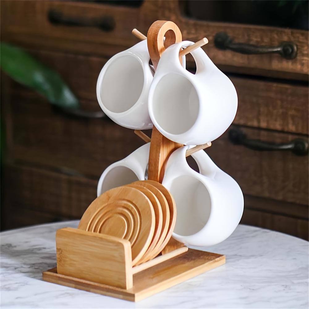 Faridabio 1 Set of Mug Stand And Coaster Set Includes a Ceramic Coffee Cup And Saucer, Perfect for Coffee Shops. This Set Features a Mug, a Coaster, And a Cup Holder, with Each Cup Holding 200Ml Or 7 Oz