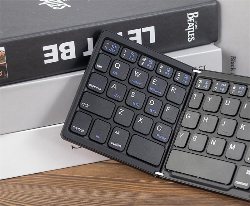 Three-mode foldable Bluetooth keyboard for tablets and mobile phones, portable mini keyboard and mouse set, rechargeable foldable wireless keyboard
