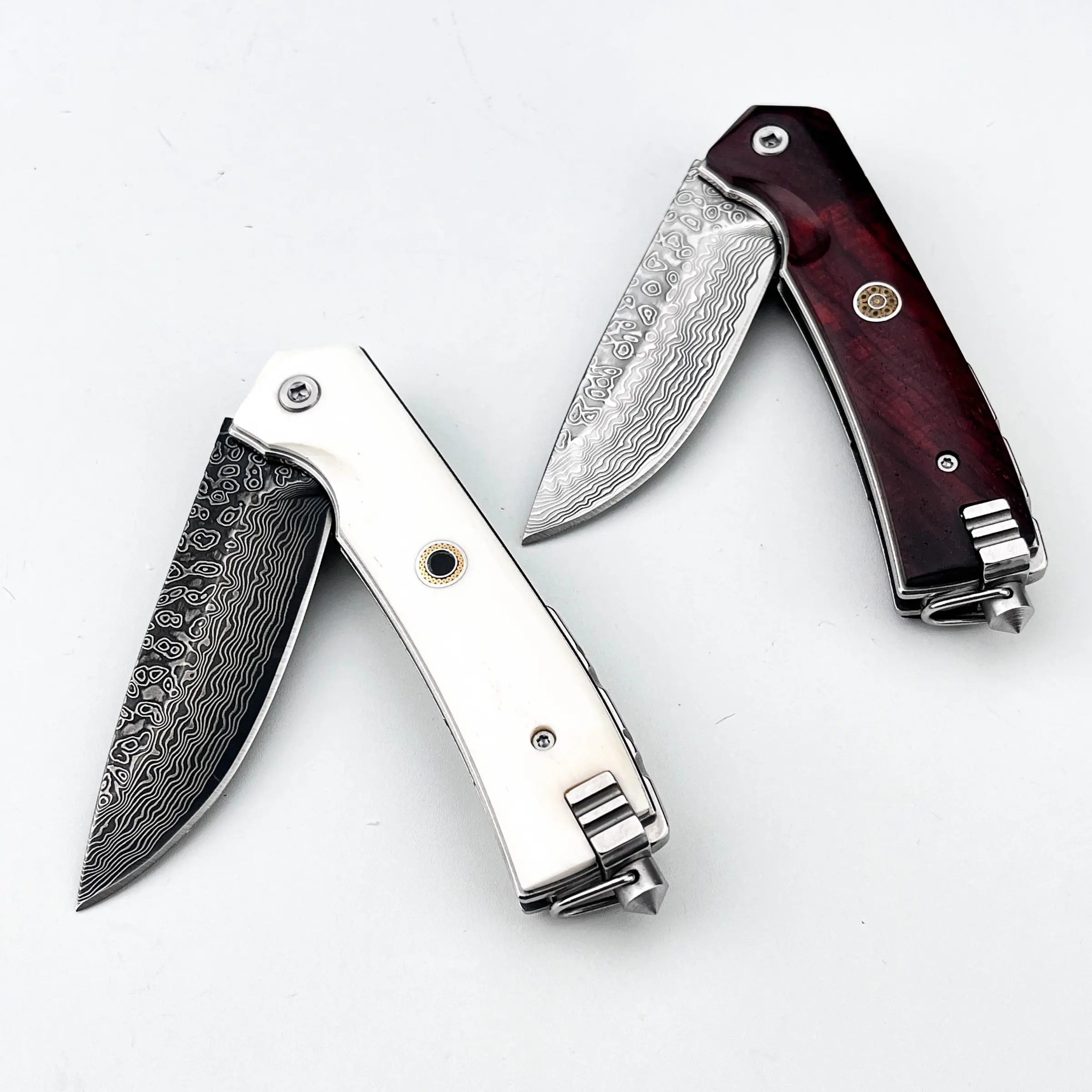Handcrafted Damascus pattern steel collectible folding knife, with rosewood and bone handles, metal pocket clip at the end, ideal for everyday carry (EDC), knife collection, and practical use in camping, hiking, and fishing.