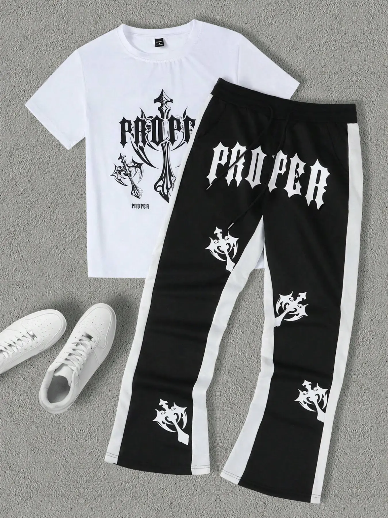 American high-street streetwear gothic cross print two-piece set: white short-sleeved shirt paired with side-striped flared sweatpants; red, orange, and black three-color men's hip-hop outfit.