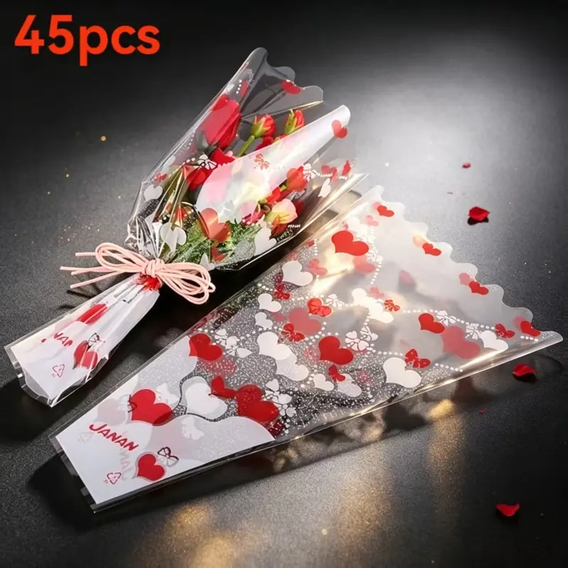 45 flower sleeves, heart-shaped multi-branch bags, suitable for Valentine's Day, Mother's Day and Teacher's Day bouquets, suitable for graduation ceremonies and other flower gift packaging. These transparent plastic bags measure 3.5 X 11 X 17.7 inches.