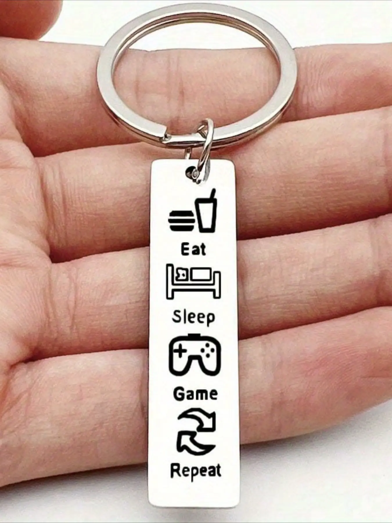 1 "Eat Game Repeat" gamer keychain, perfect for teens