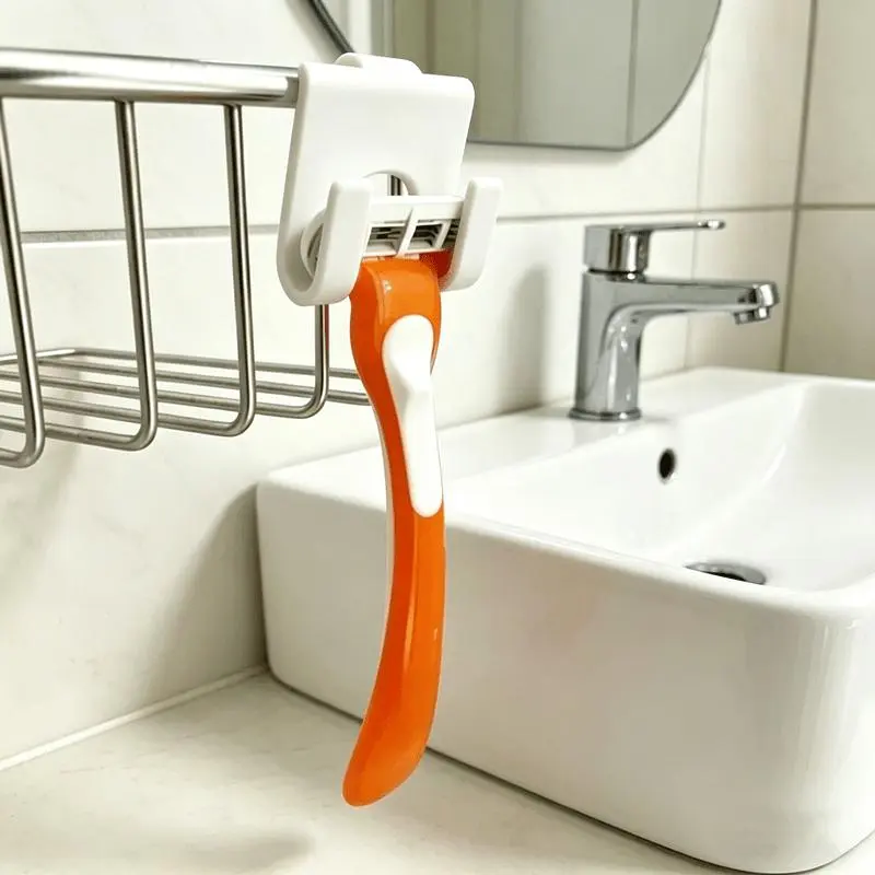 1pc White Wall-Mounted Razor Rack, No Drilling Required, Can Be Installed with Adhesive or Suction Cup. Waterproof and Moisture-Resistant, Constructed from Long-Lasting Sturdy Plastic. Ideal for Bathroom and Shower Use, Fits All Manual