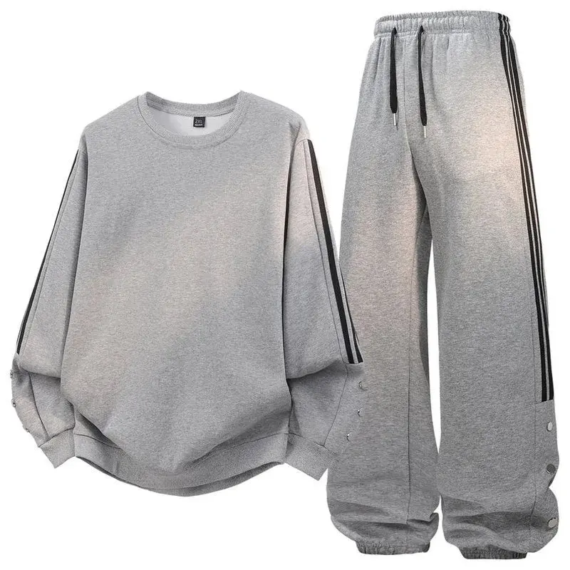 Stripe sleeve button cuff crew neck sweatshirt and drawstring wide leg jogger pants two-piece set, three vertical stripe detailing, soft fleece fabric, loose casual matching tracksuit for daily street and sports outfits