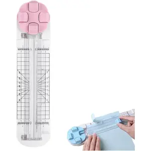 Multifunctional paper-cutting and scrapbooking tool featuring a bidirectional cutter; equipped with blades for straight, wavy, and perforated cuts, as well as a scoring blade—suitable for cutting paper, coupons, photos, and cards.
