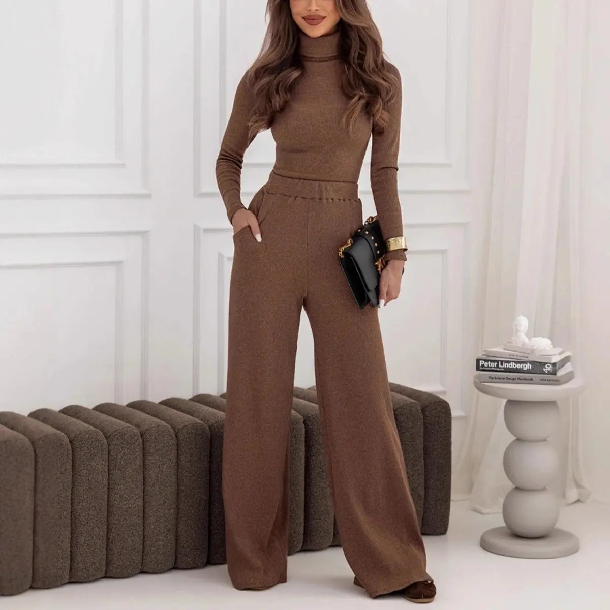 Cozy, laid-back knit two-piece set for autumn and winter—featuring a slim-fit turtleneck and wide-leg trousers. Soft, skin-friendly, and perfect for an effortlessly relaxed look.