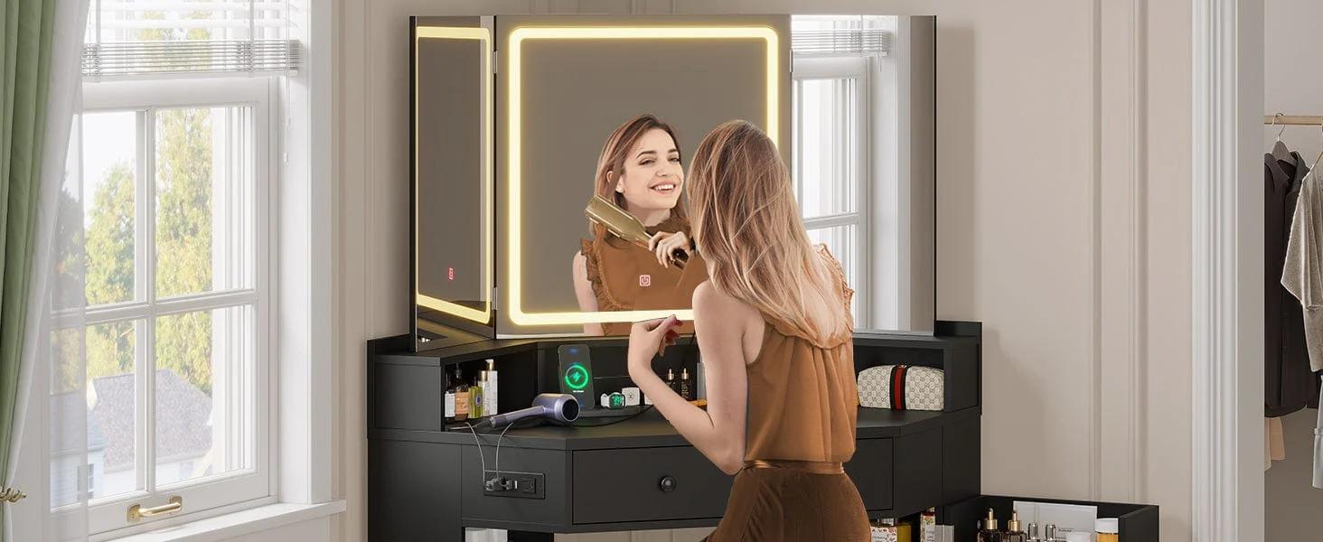 Corner Makeup Vanity with Tri-Fold Mirror and Cushioned Storage Stool Black