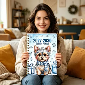 2027-2030 monthly planner, A5 size, 124 pages of high-quality paper, gradient inner pages. Spiral notebook with a Yorkshire dog wearing a blue scarf and winter snowflakes, watercolor-style agenda diary.