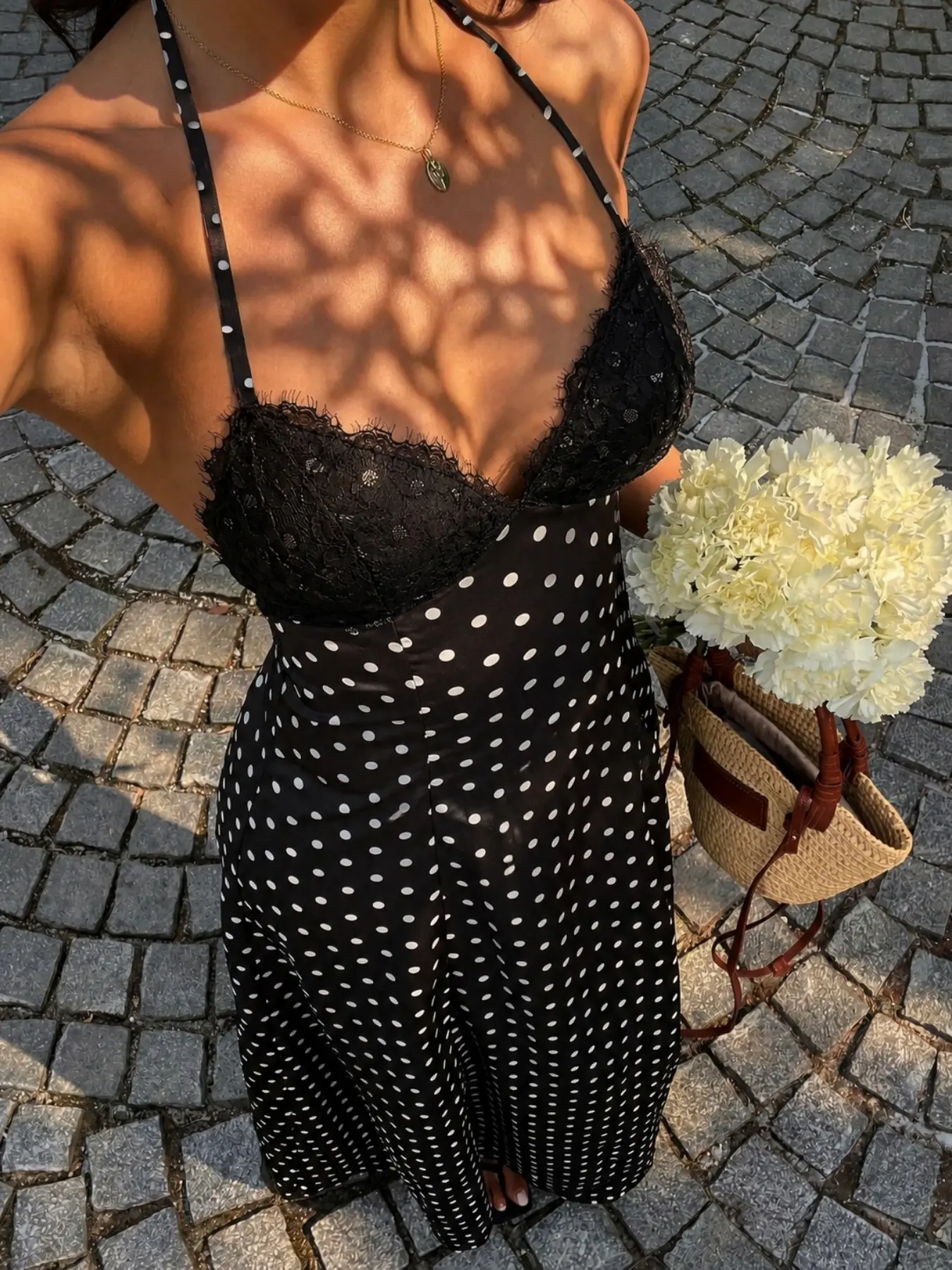French Vintage Black White Polka Dot Halter, Sleeveless, Spaghetti Strap Midi Dress Eyelash Lace V Neck Satin Slim Flowy Sundress Casual ideal for European town sightseeing beach coastal café dates sunset street shoots and holiday matching looks