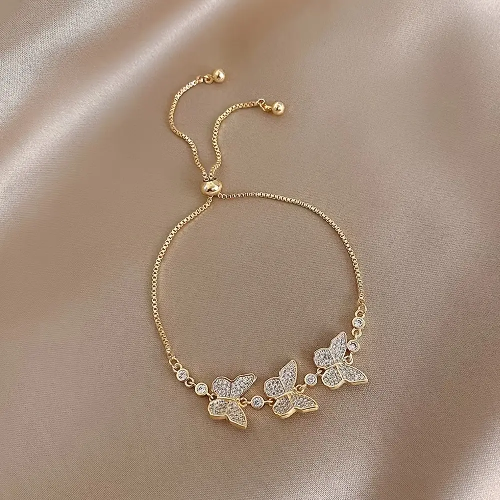 A Luxurious Adjustable Size Bracelet for Women Featuring a 14K Gold-Plated Butterfly Design