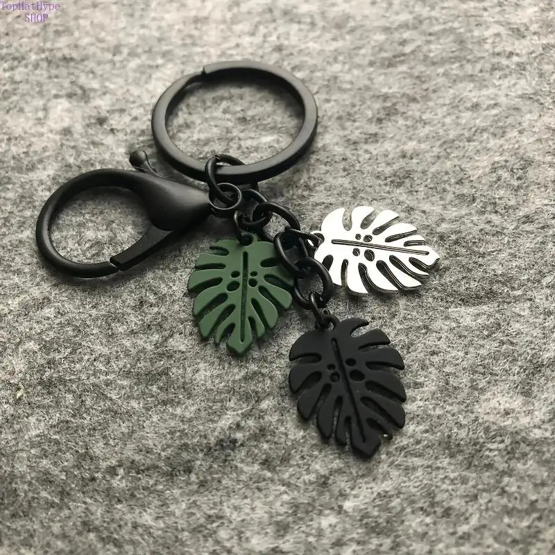 3D Metal Monstera Leaf Keychain Charm, cute plant‑themed accessory for plant lovers. Two‑pack mini gift for purse, bag and car, great for Christmas, anniversary, engagement and business gifting.