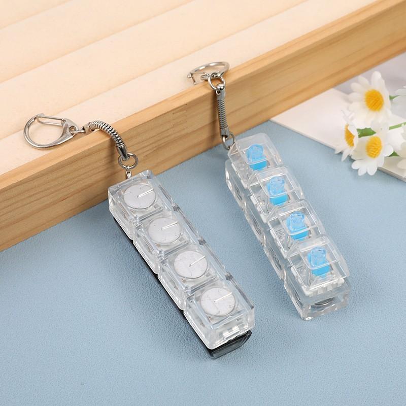 4-key decompression button, Russian Tetris keychain, mechanical key with light-emitting function, stress-reducing fingertip toy key.