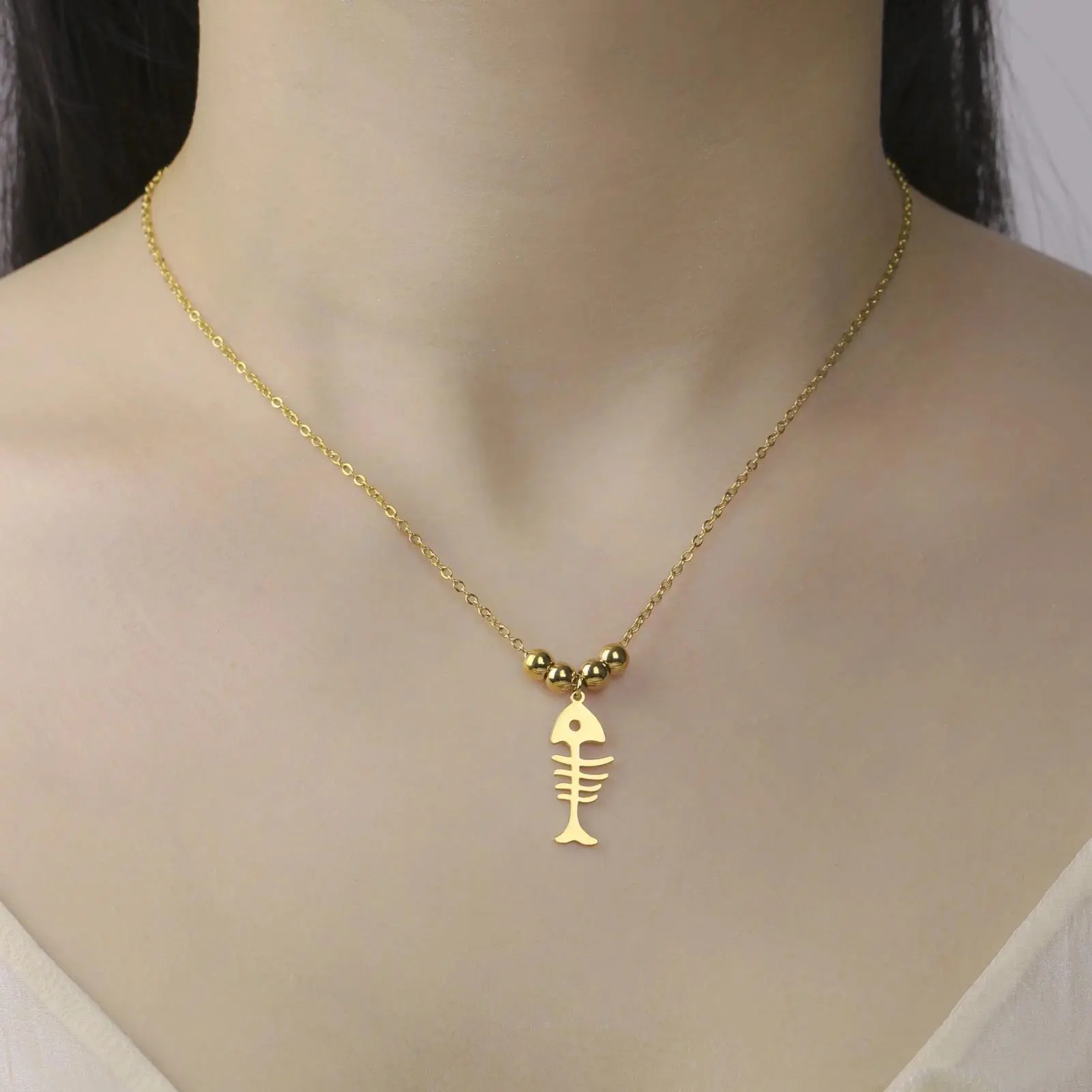 Women's Minimalist Stainless Steel Fish Bone Pendant Necklace - Metal-Coated Adjustable Thin Chain, Unisex Names, for Casual Daily Wear Fashion Costume Jewelry, Animal