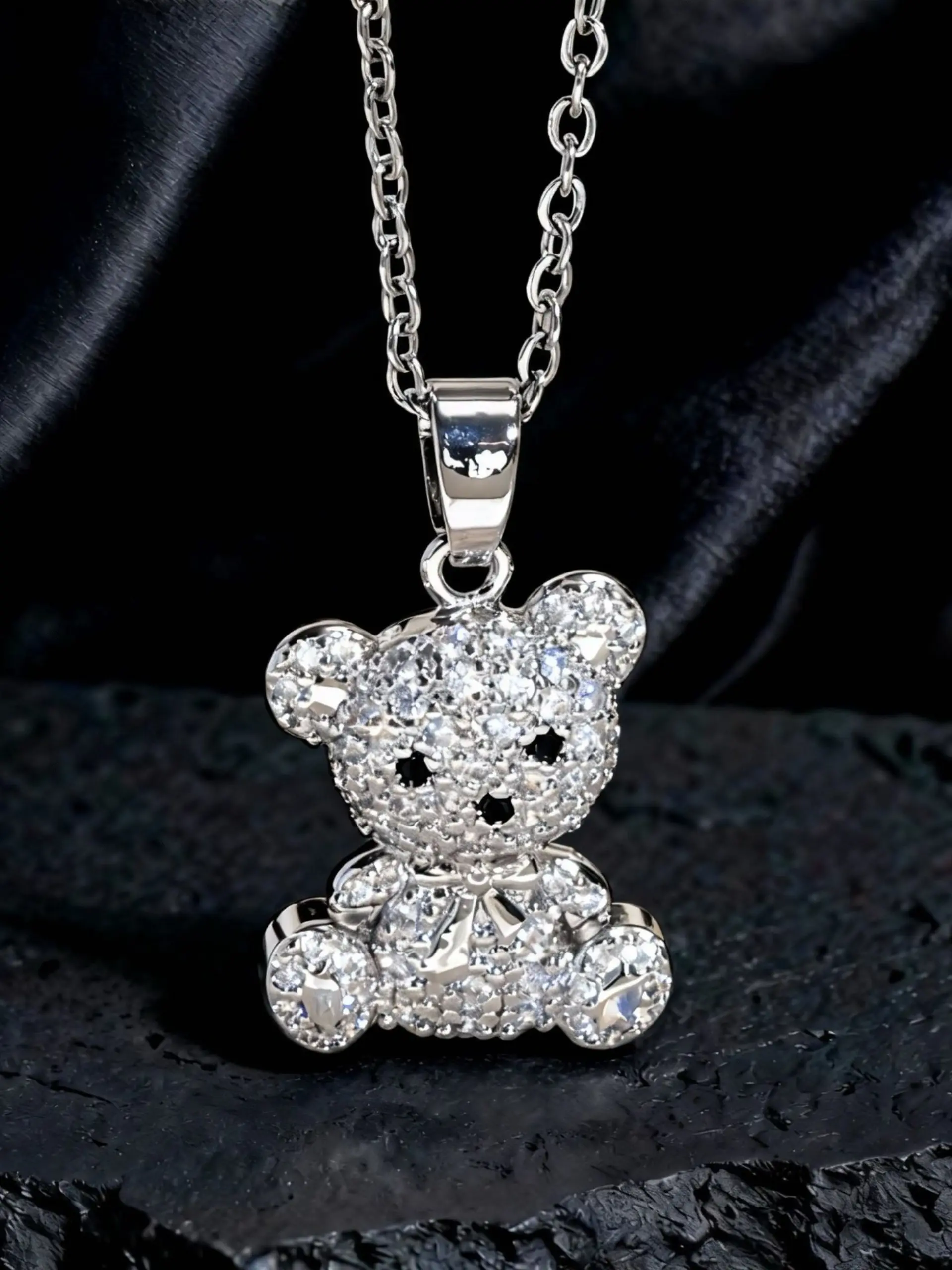 This stylish and adorable bear-shaped necklace features a cute animal bear pendant necklace with a sparkling cubic zirconia design. Perfect for women and girls, it also makes an excellent gift choice.