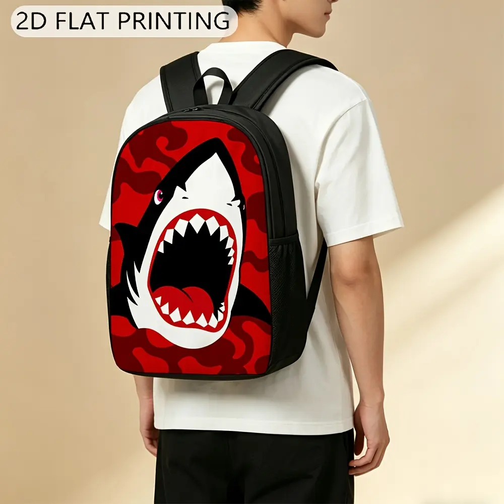 Durable unisex backpack featuring a red camouflage shark pattern, adjustable straps, and zipper closures; large 2D-print design suitable for school use by teens—lightweight yet spacious.