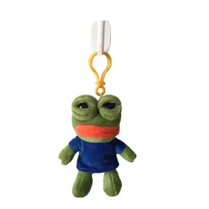 Mini Pepe the Frog Plush Doll Sad Meme Frog Soft Stuffed Toy with Blue Shirt Collectible Figurine for Backpack Decor